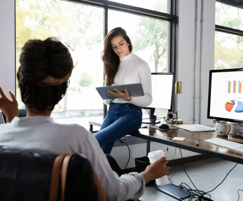 Image of Kobiton employees collaboration at workstation