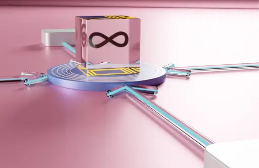 Image of a cube with an infinity symbol in the middle of a table