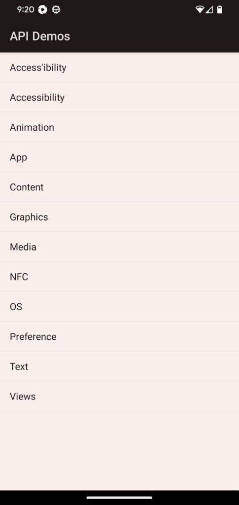 Screenshot of the main menu in the 'API Demos' app on an Android device. The menu displays various options such as Accessibility, Animation, App, Content, Graphics, Media, NFC, OS, Preference, Text, and Views